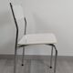 Modernist chair in chrome metal and white laminate, 1960s style.