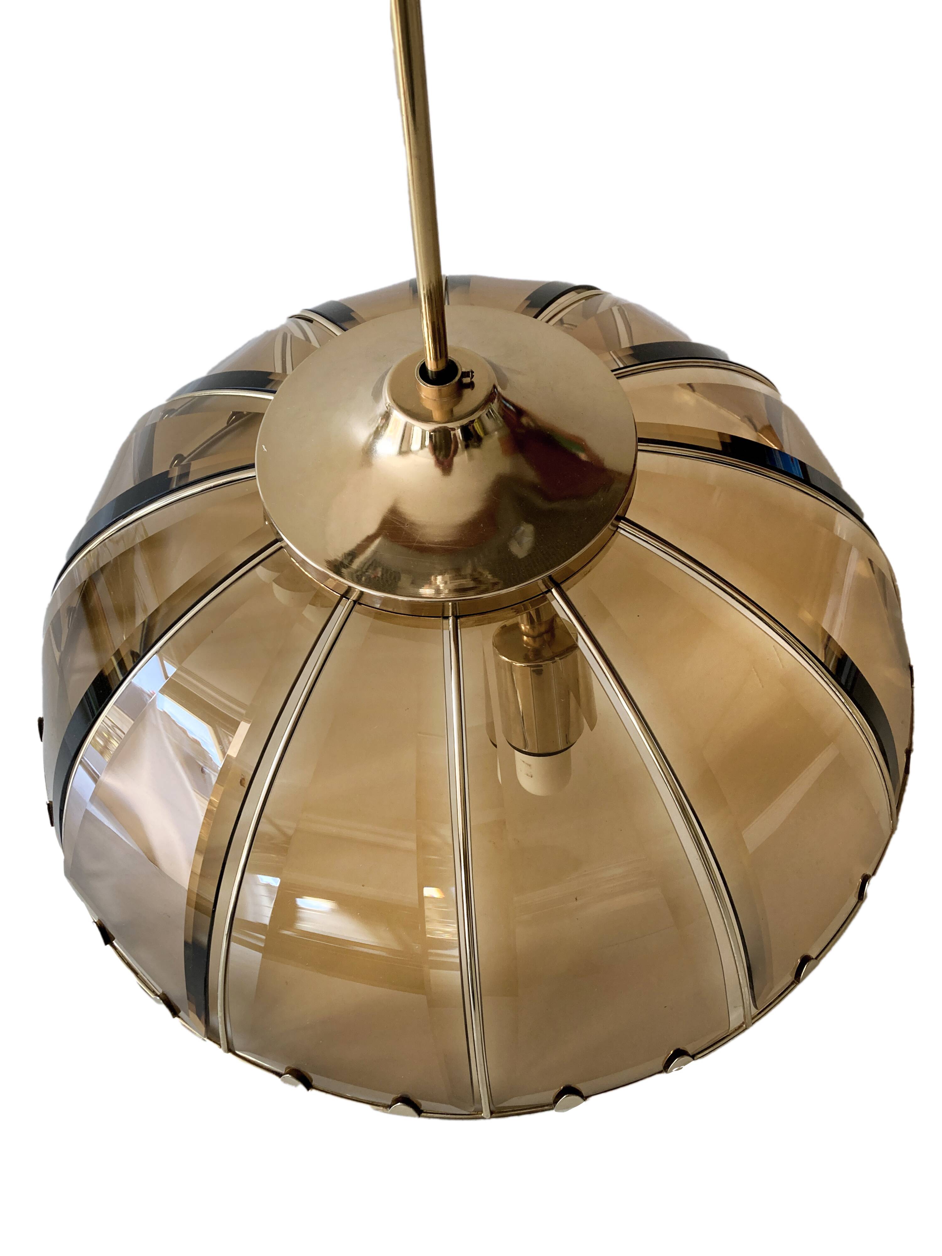 Vintage chandelier with glass dome and vintage gold metal