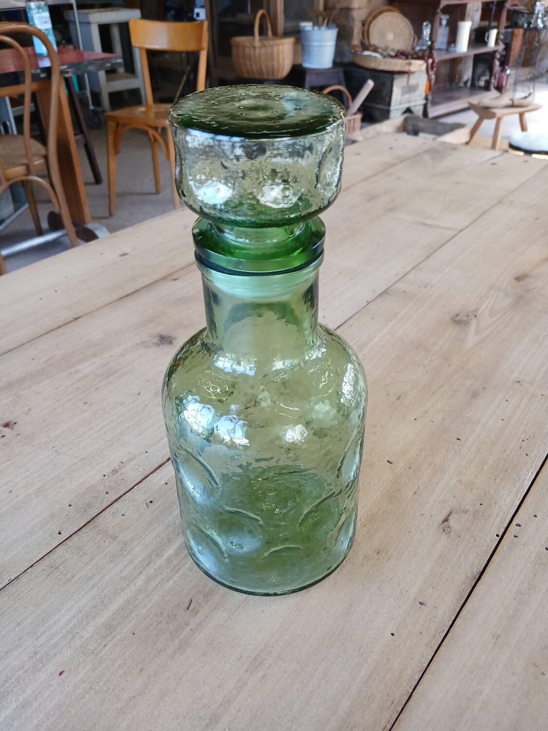 Antique green carafe