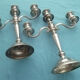 Pair of silver-colored metal candlesticks
