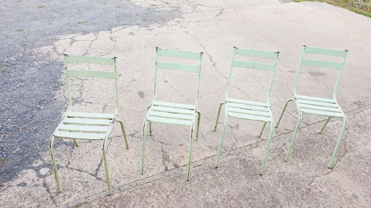 Four vintage metal chairs