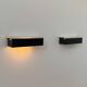 Pair of vintage wall sconces, painted black and white metal, Sweden 1970.