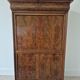 Mahogany secretary desk with marble top and interior mirror.