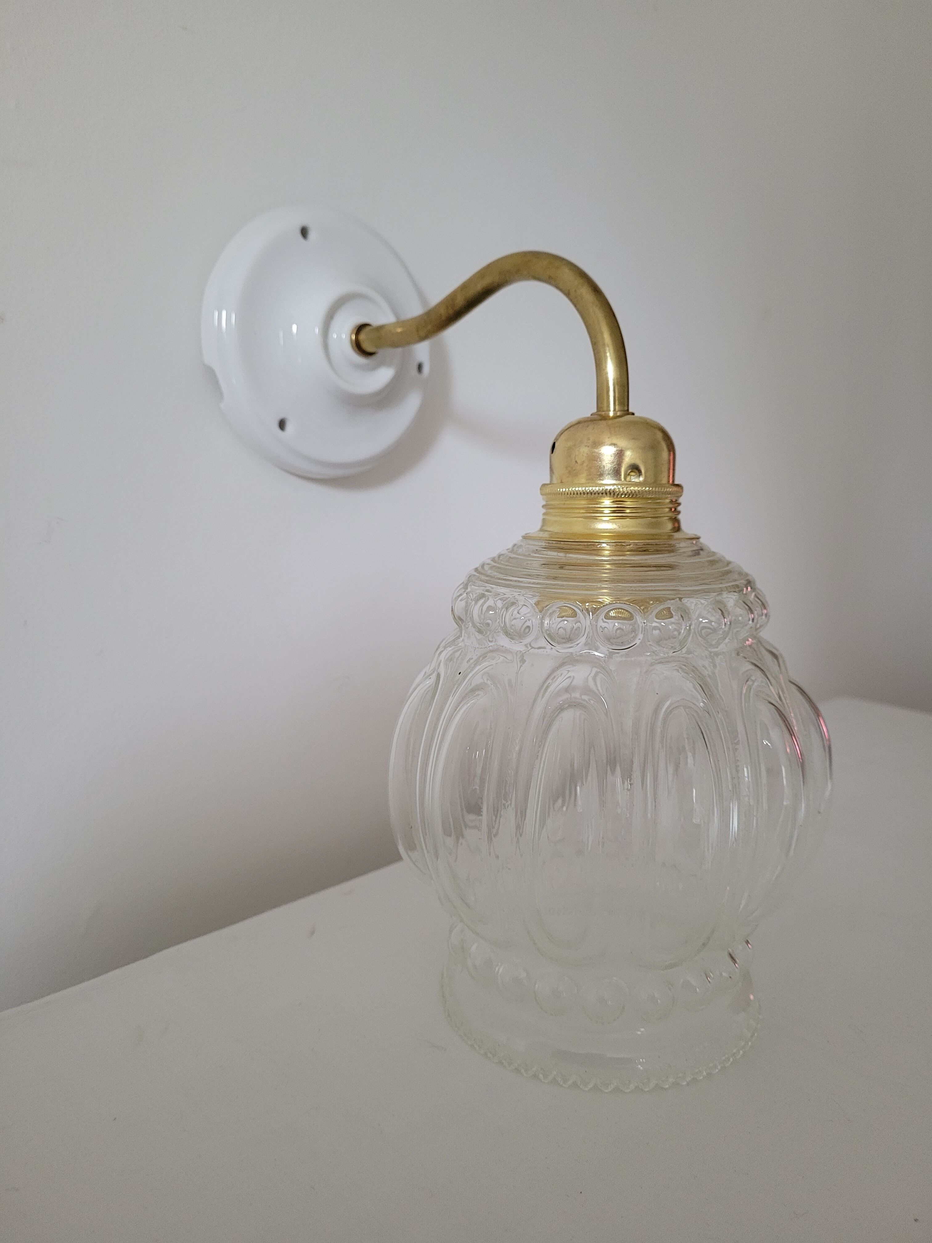 Porcelain, brass and glass wall lamp