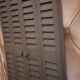 Dark grey wooden trompe l'oeil shutter mirror 1990 / wall decoration object Shutter-style mirror