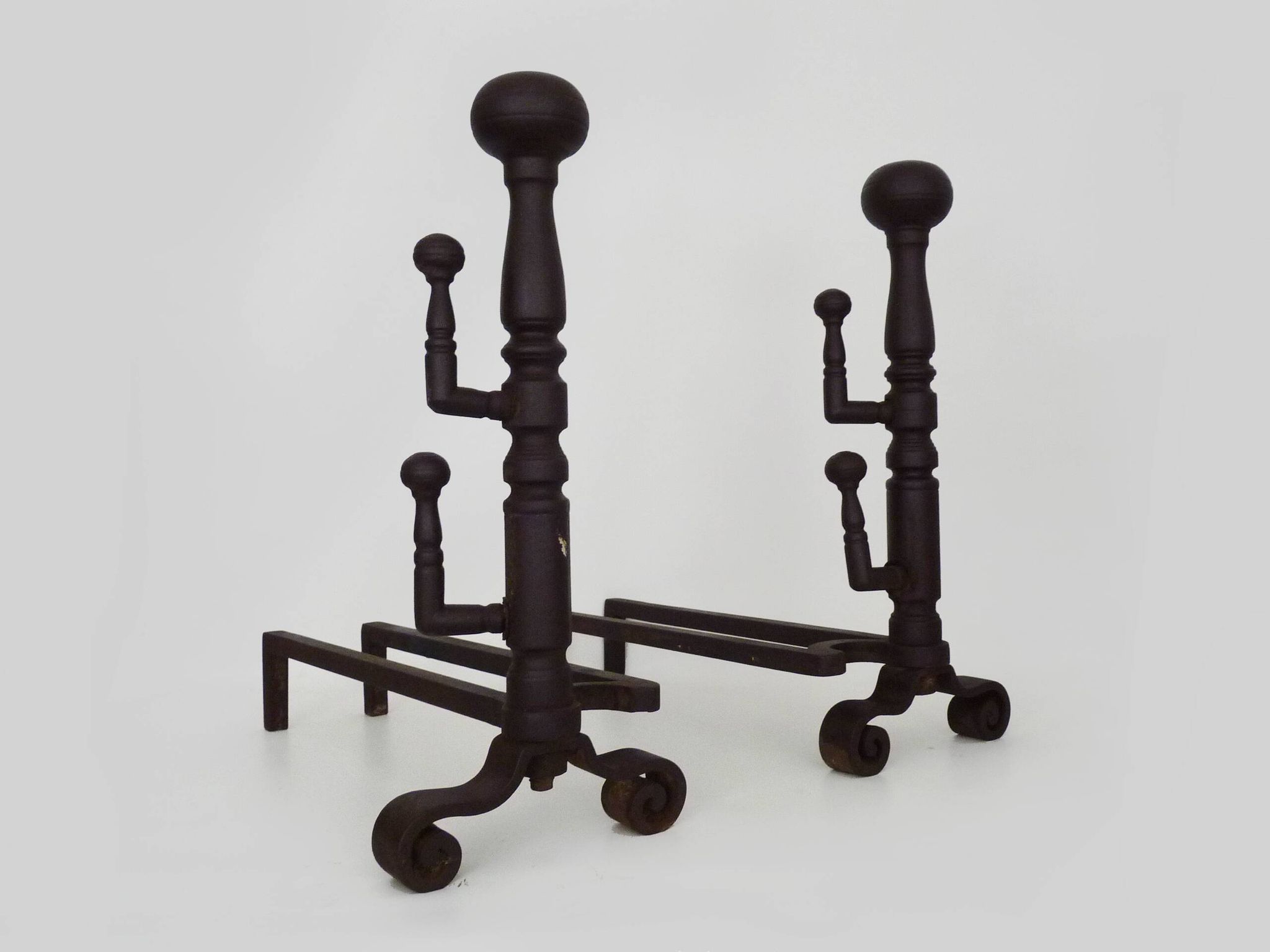 Large pair of wrought iron fireplace andirons. France, 19th century.
