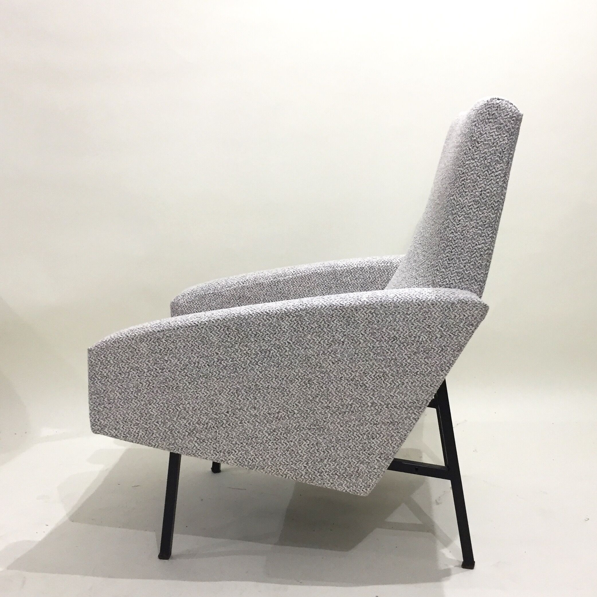 Reupholstered modernist armchair