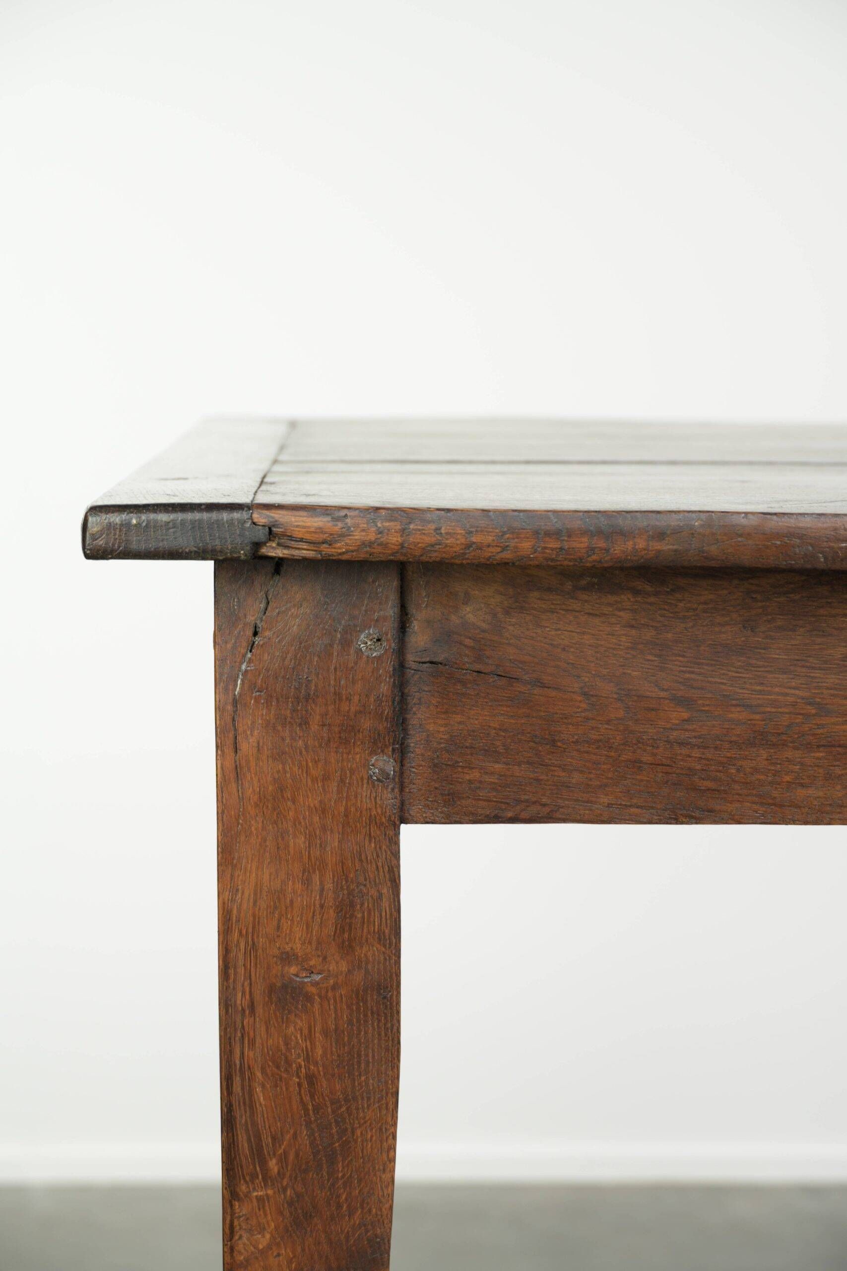 Antique French oak dining table from the early 19th century