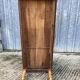 Antique farmhouse table in solid cherry wood with turned legs.