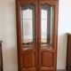 Antique cherry wood display cabinet in Louis XV style