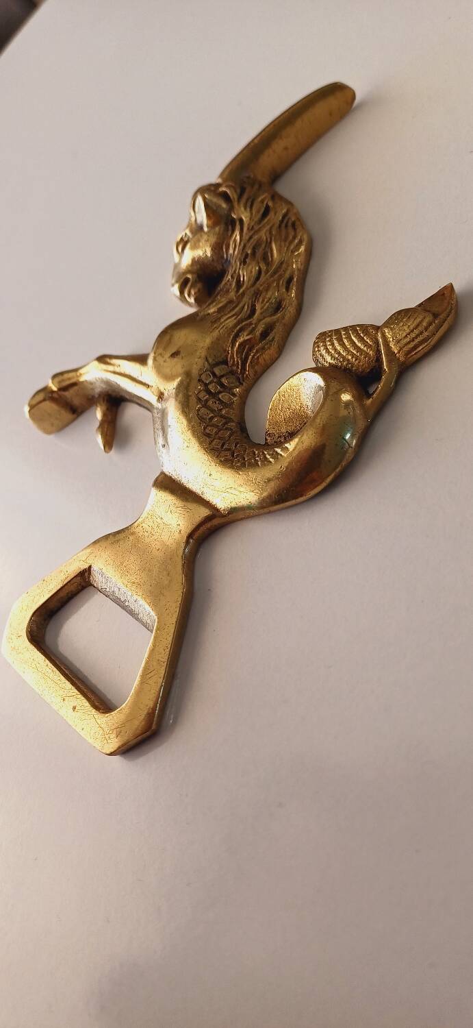 Animal bottle opener in gilded bronze