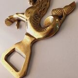 Animal bottle opener in gilded bronze