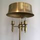 Brass floor lamp with a brass shade. Attributed to Maison Charles