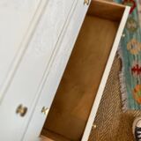 Restored wooden art deco chest of drawers with gilded handles