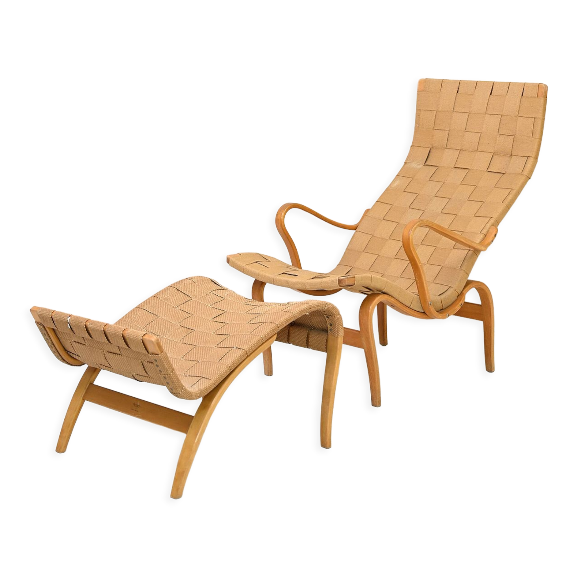 'Pernilla' armchair and footstool designed by Bruno Mathsson