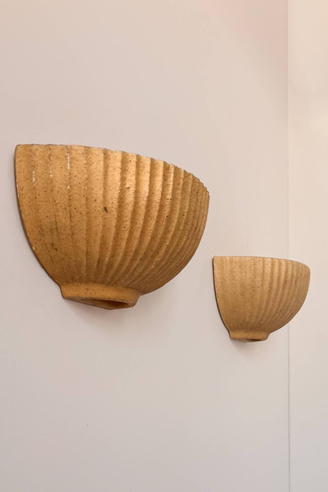 Pair of vintage beige ceramic wall lights, France, 1970.