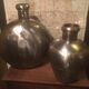 Pair of polished metal water flasks from Rajasthan.