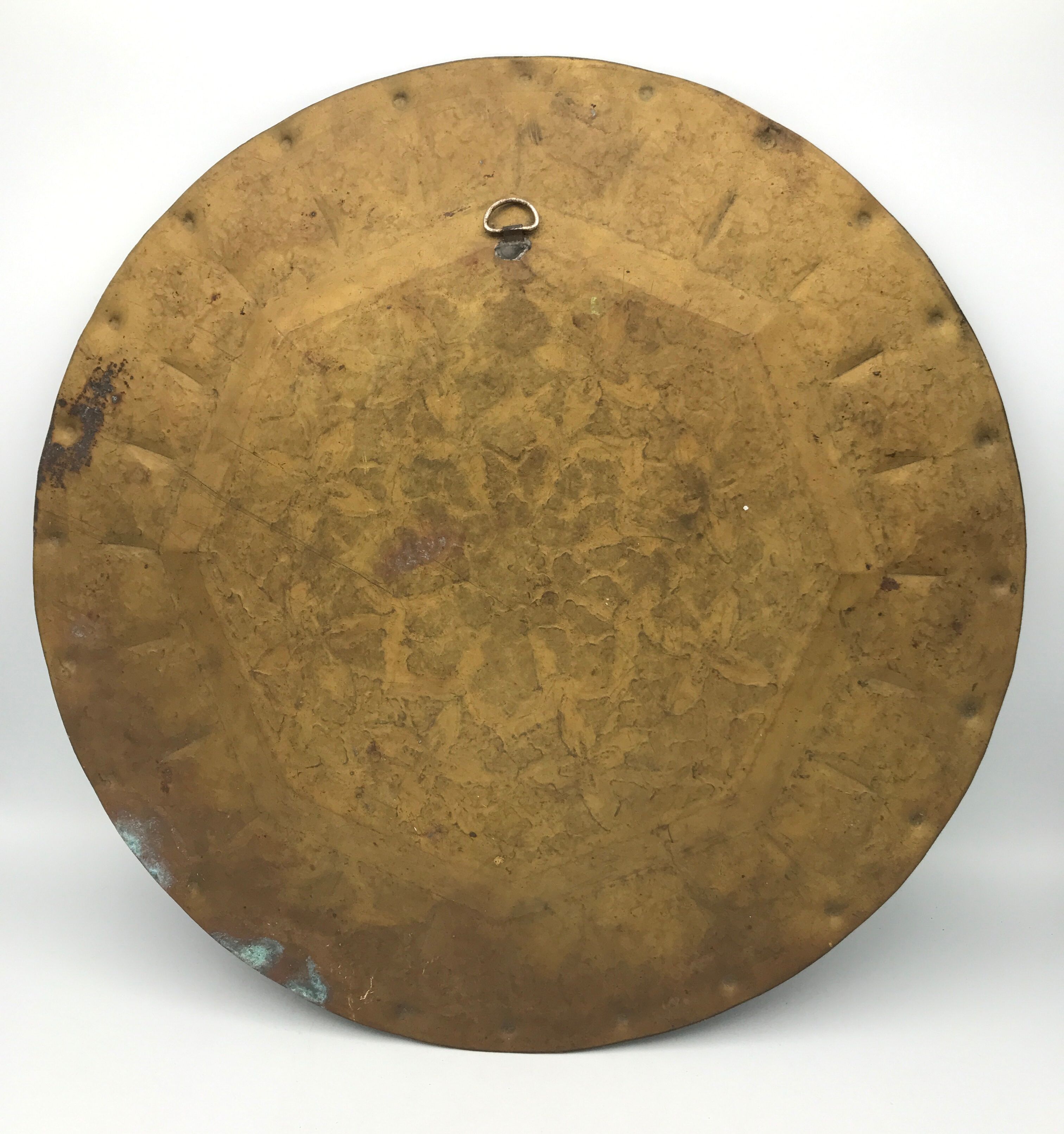 Oriental brass tray with chiseled decoration of arabesques and flowers