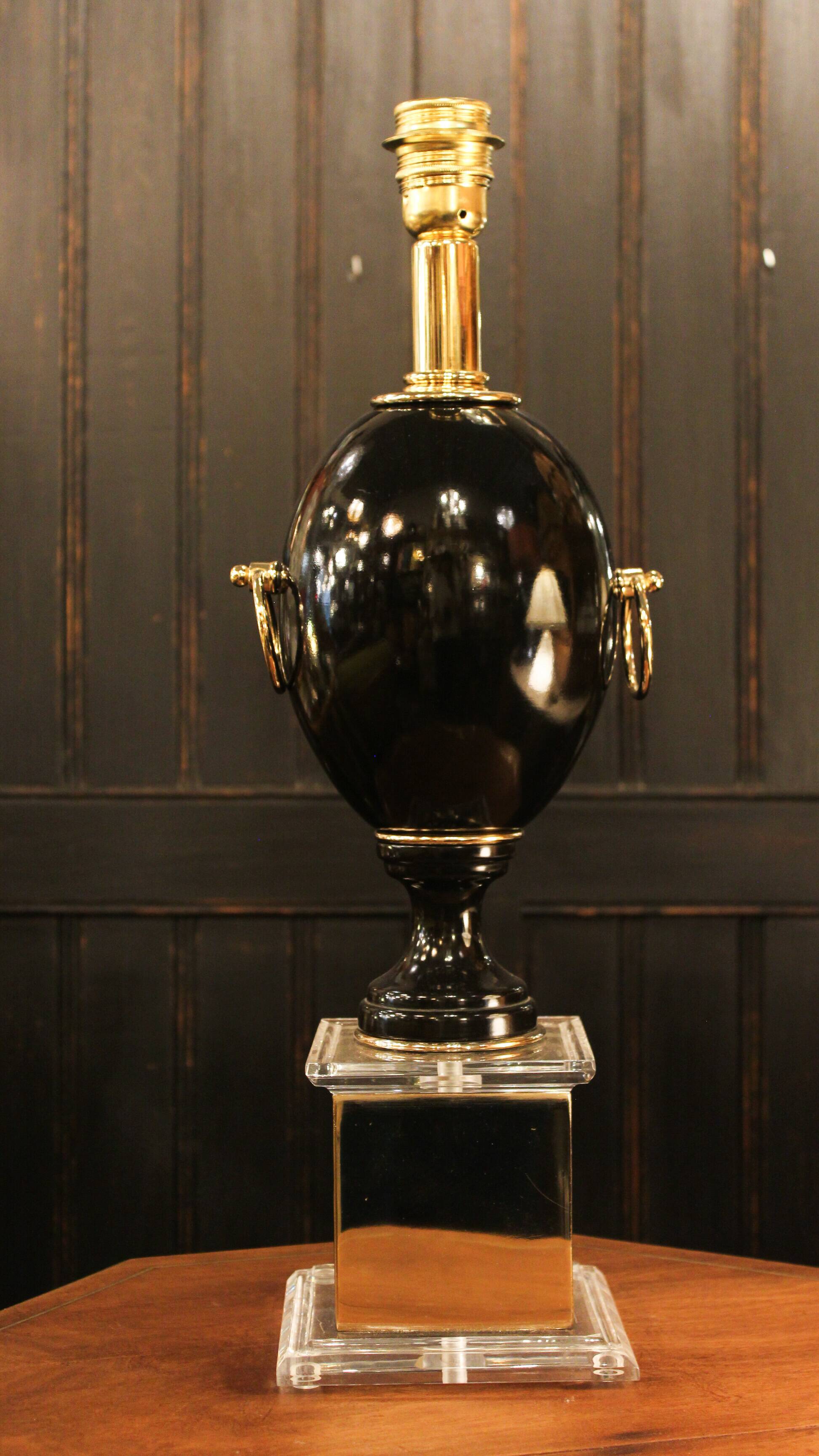 Black lamp in Hollywood Regency style