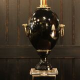 Black lamp in Hollywood Regency style