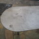 Old bistro table in marble and godin cast iron foot