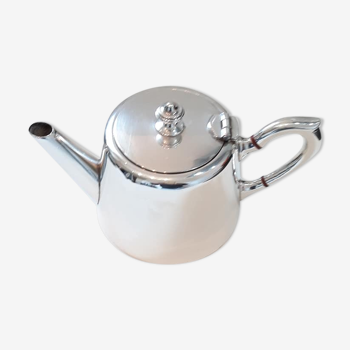 Egoistic silver metal teapot