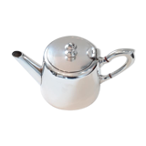 Egoistic silver metal teapot