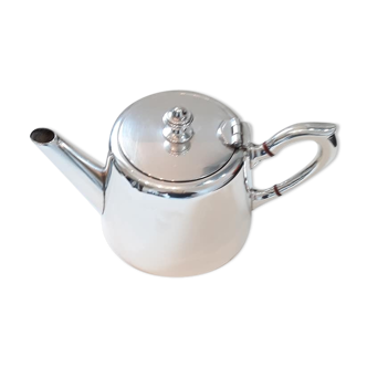 Egoistic silver metal teapot