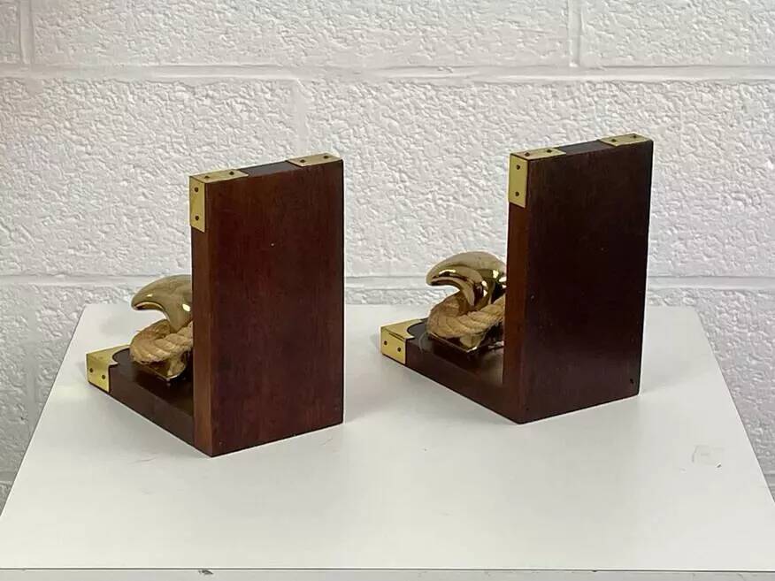 Pair of antique wooden and brass bookends