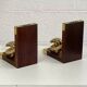 Pair of antique wooden and brass bookends