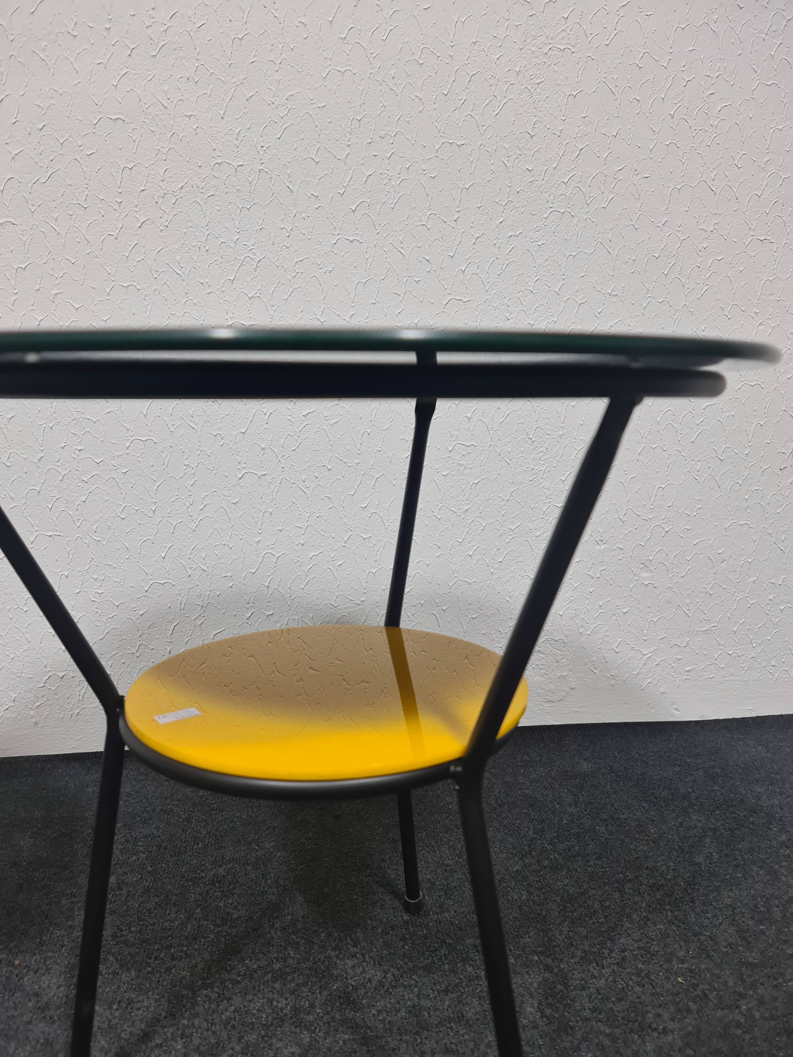 Pair of vintage glass topped side tables