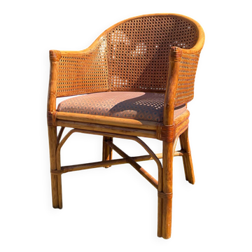 Mc Guire style armchair in rattan and caning from the 1980s.