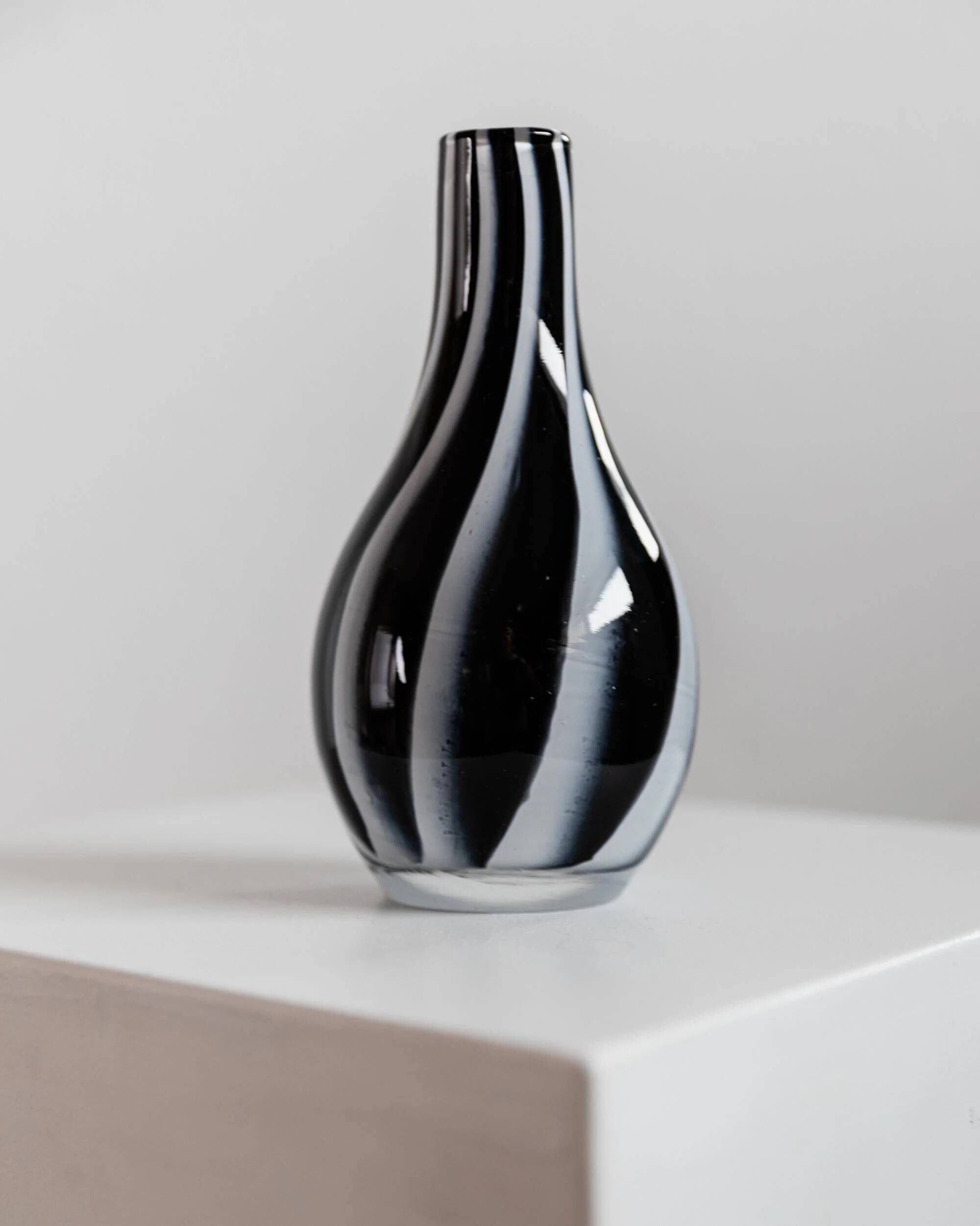 Vintage Murano glass vase from the 1980s, black and white swirl pattern, thick Italian art glass.