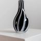 Vintage Murano glass vase from the 1980s, black and white swirl pattern, thick Italian art glass.