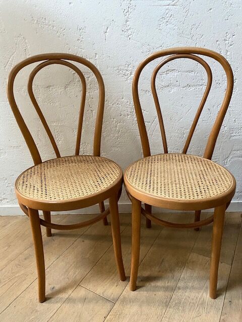 Pair of tanned bistro chairs