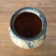 Round vase in chamotte clay / mixed with blue speckled glaze – Signed – H 13.5