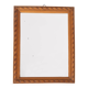 Small old wooden mirror with carved frame