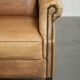Comfortable cowhide wingback armchair with a timeless English look