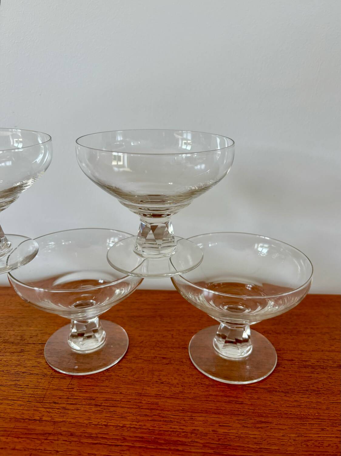 set of 5 crystal champagne glasses, worked and faceted feet, 1960