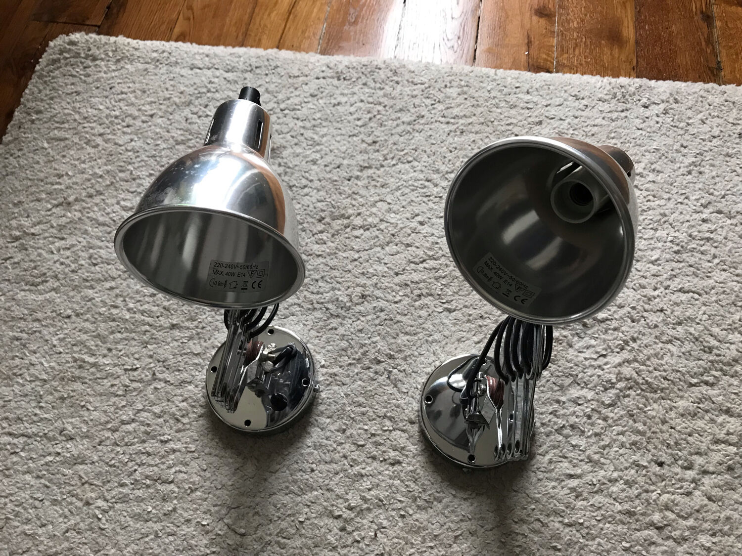 Stainless steel articulated wall lamps