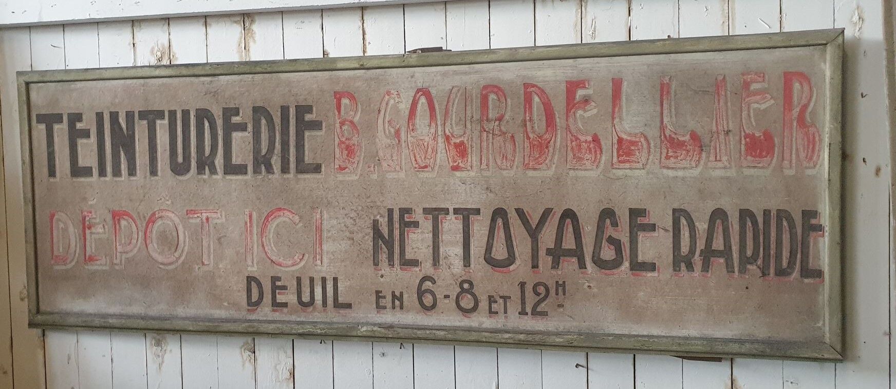 former big wooden advertising sign