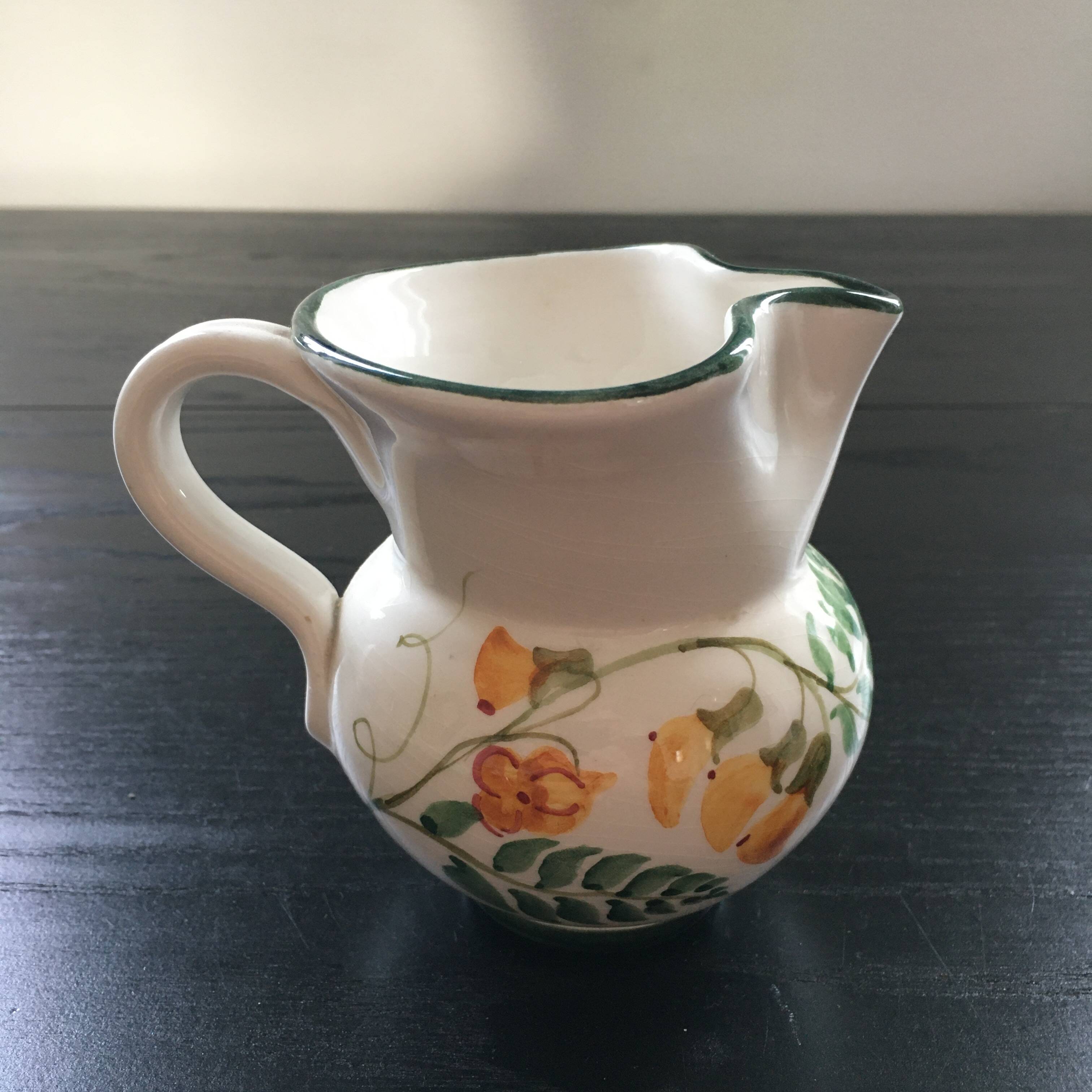 Small pitcher with floral decoration