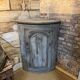 Eighteenth-century corner cabinet with a patina.
