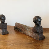 Pair of cast iron chenets, Love victorious