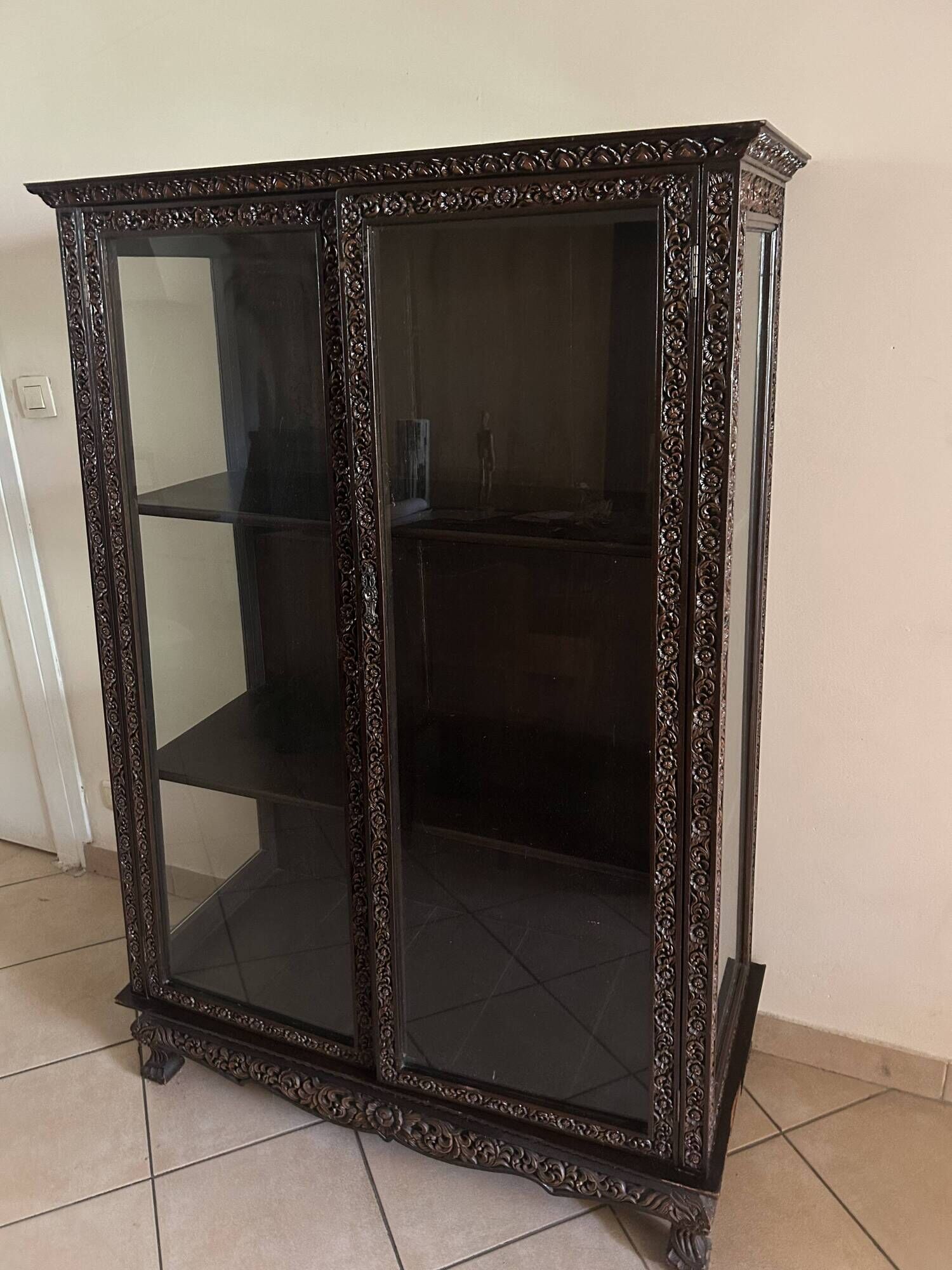 Thai trapezoidal display cabinet in carved solid wood