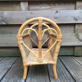 Old rattan magazine rack