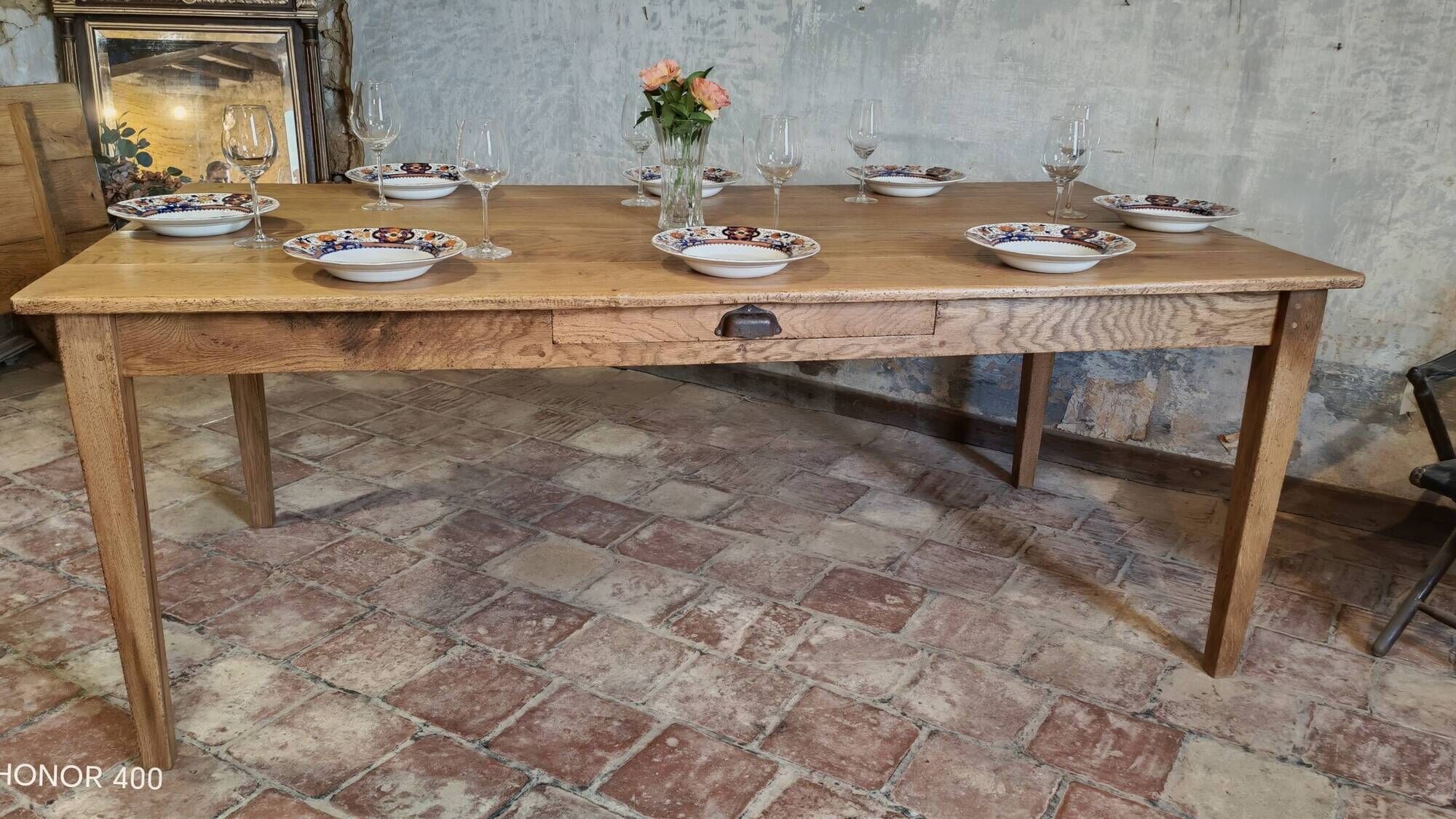 Large authentic farmhouse table made of solid French oak.