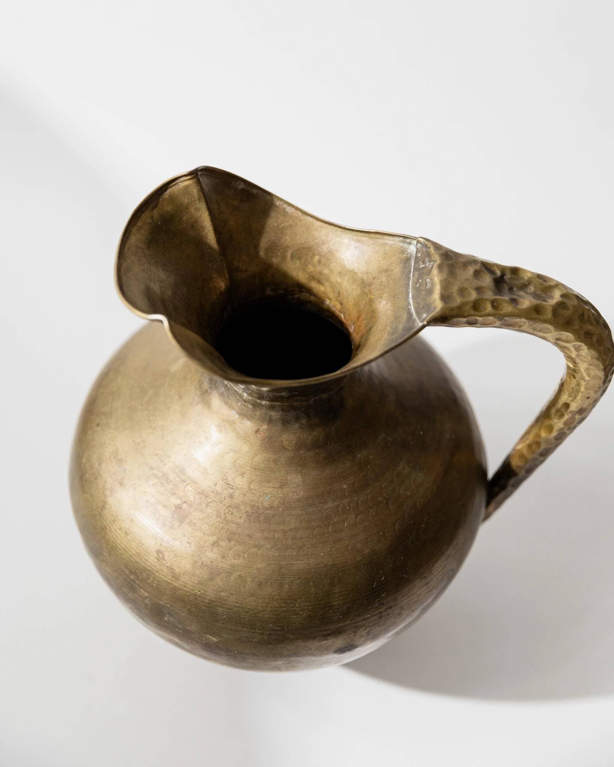 Vintage brass vase from the 1940s, hand-hammered metal, amphora shape, Italian design from the 1940s.