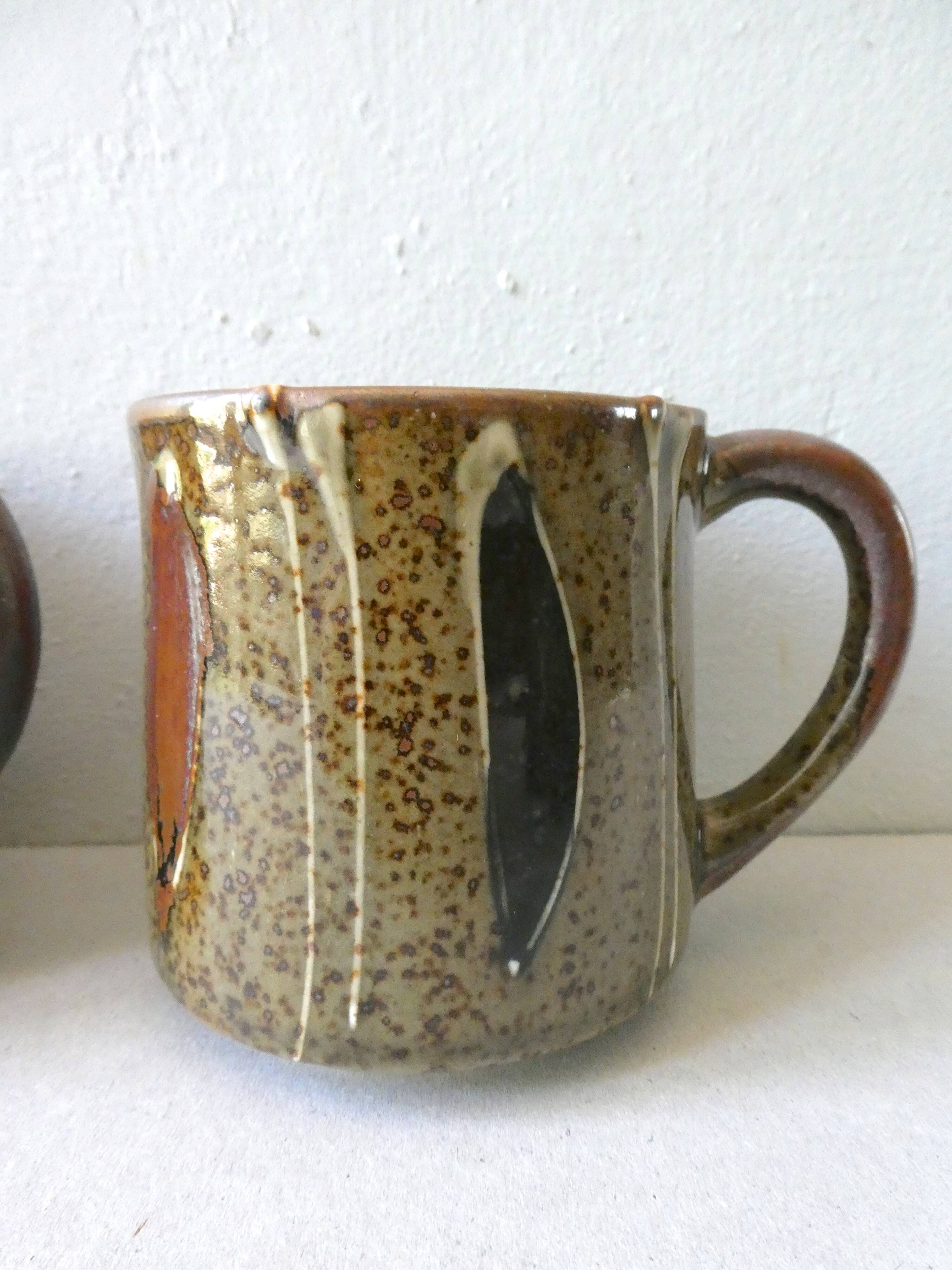 Set of 4  sandstone mugs 70 years