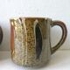 Set of 4  sandstone mugs 70 years